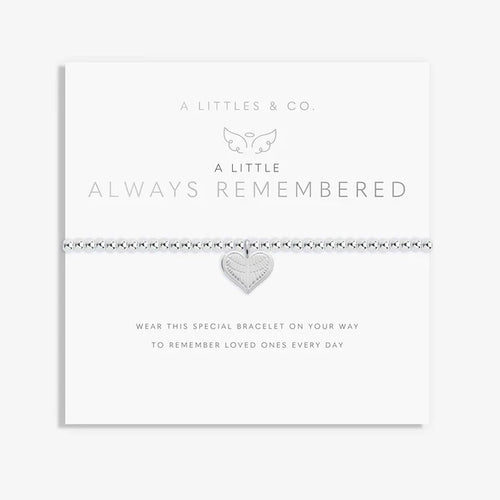 A Littles & Co Always Remembered bracelet displayed on sentiment card featuring silver heart charm with angel wings