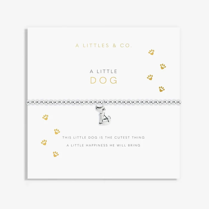 A Littles & Co. A Little Dog bracelet on sentiment card with silver beaded stretch design and dog charm