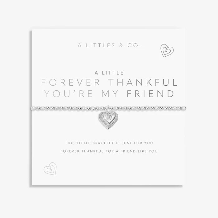 A Littles & Co. A Little Forever Thankful bracelet displayed on sentiment card with silver heart charm and beaded bracelet