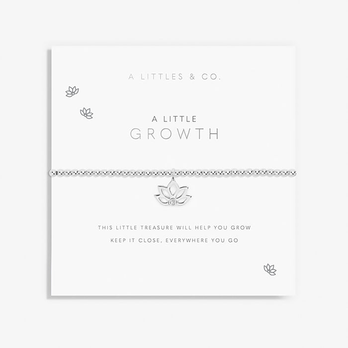 Silver bracelet with lotus design on a white card with 'A Littles & Co.' branding.