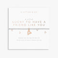 Necklace with heart pendants on a white card with text, featuring 'A Littles & Co.' brand.
