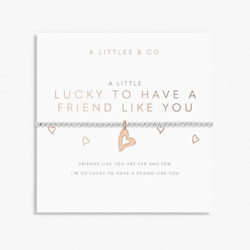 Necklace with heart pendants on a white card with text, featuring 'A Littles & Co.' brand.