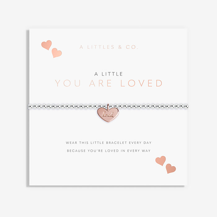 Bracelet set with heart charm on a white card with text, featuring 'A Littles & Co' branding.