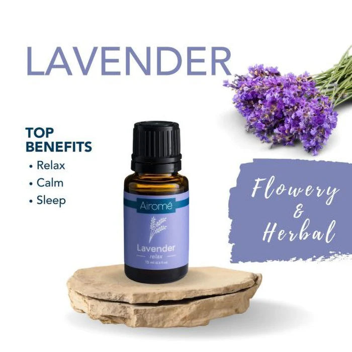 Lavender essential oil bottle with lavender flowers on a white background