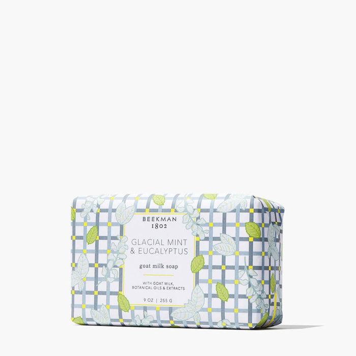 Beekman 1802 goat milk soap bar with plaid design on a white background