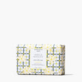 Bar of soap with decorative packaging on a white background