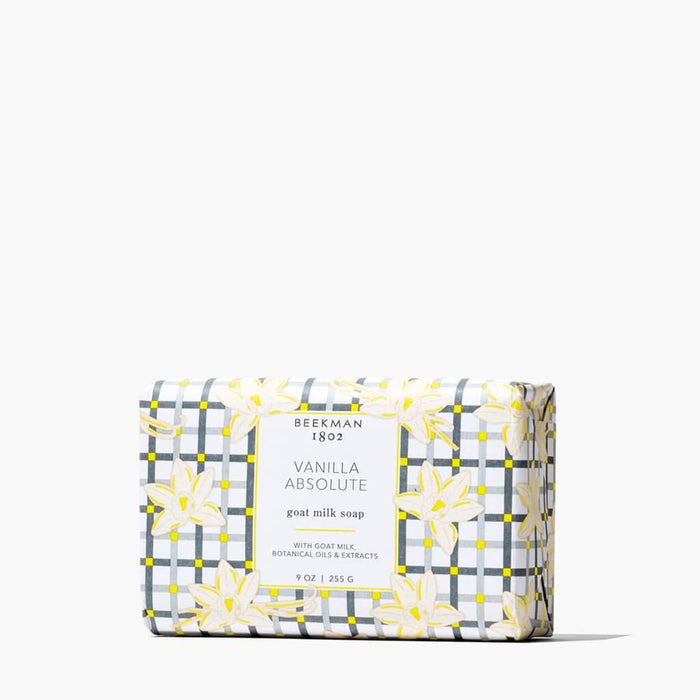 Bar of soap with decorative packaging on a white background