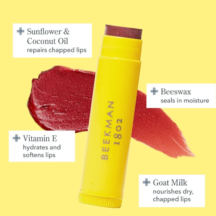 Ingredients for lip balm displayed, including wax, oils, and flavoring components.