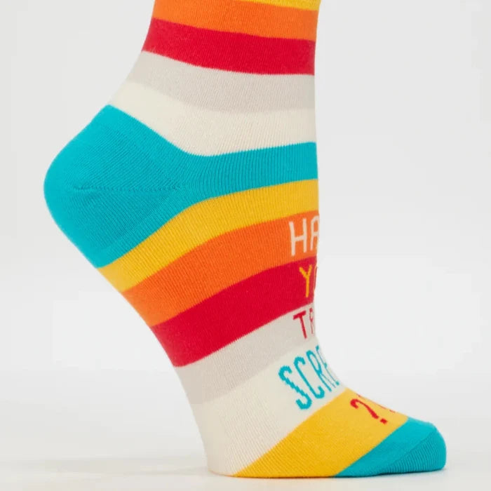 Colorful striped sock with text on a white background