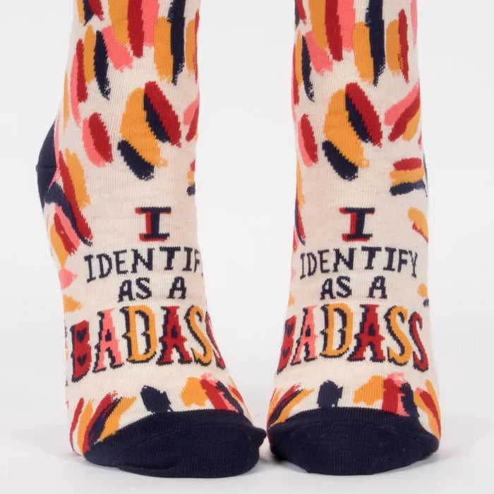 Pair of socks with colorful design and text on a white background