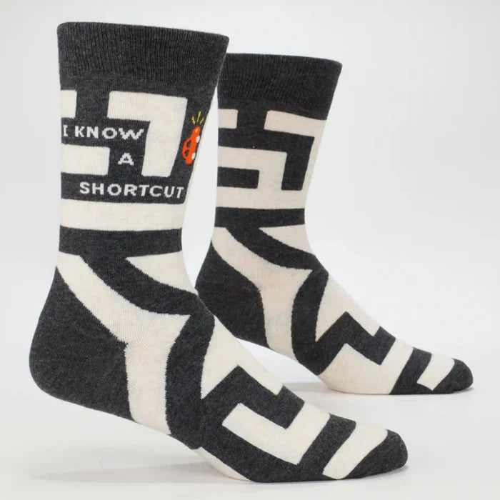 Black and white socks with geometric pattern on a white background