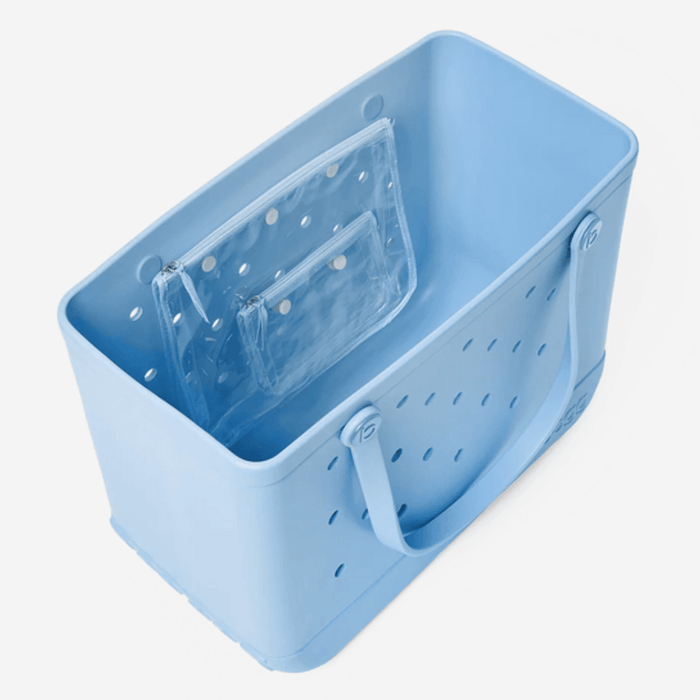 Original Bogg Bag in Blue Skies – large light blue waterproof tote with perforated sides, dual handles and two clear insert bags ideal for beach, travel, or daily use.
