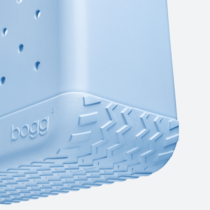 Close-up of the Original Bogg Bag in blue skies with textured surface