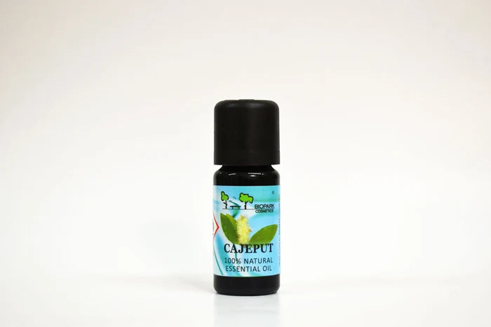 Bottle of Cajeput essential oil on a white background