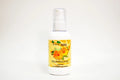 Bottle of calendula oil with a yellow label on a white background