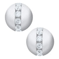 Pair of silver spherical earrings with clear gemstones on a white background