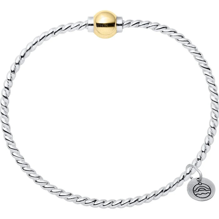 Silver bracelet with a gold clasp on a white background
