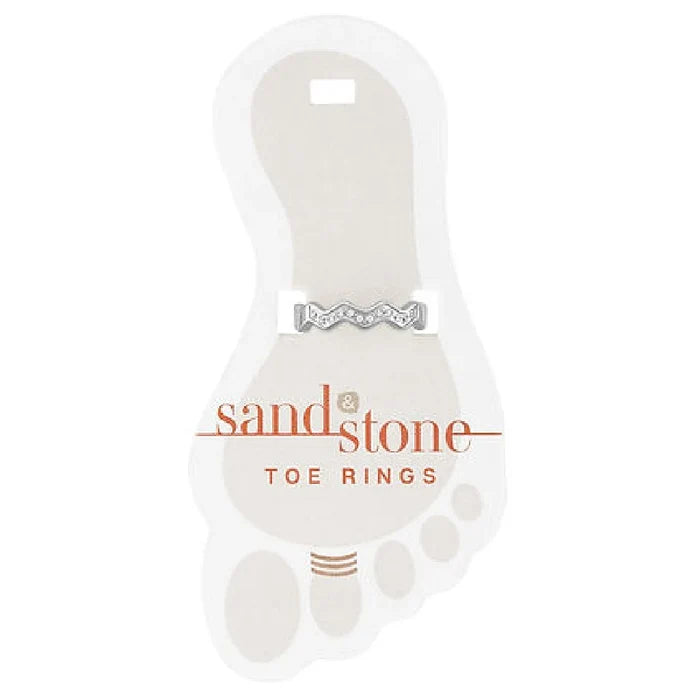 A collection of sandstone toe rings nestled in pristine white packaging, highlighting their earthy tones and craftsmanship