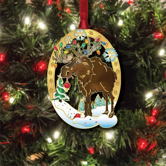 Decorative Christmas ornament with a moose on a Christmas tree.