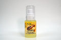 Bottle of organic chia seed oil with a white background