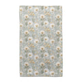 A blue and white floral print blanket draped elegantly, showcasing intricate flower patterns on a soft fabric.