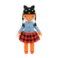Full front view of Cuddle + Kind Sadie the Fox wearing a blue sweater, plaid skirt, and black knit hat