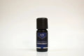 Peppermint essential oil bottle by Elite Oils on a white background