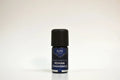 Bottle of Elite Oils Roman Chamomile essential oil on a white background