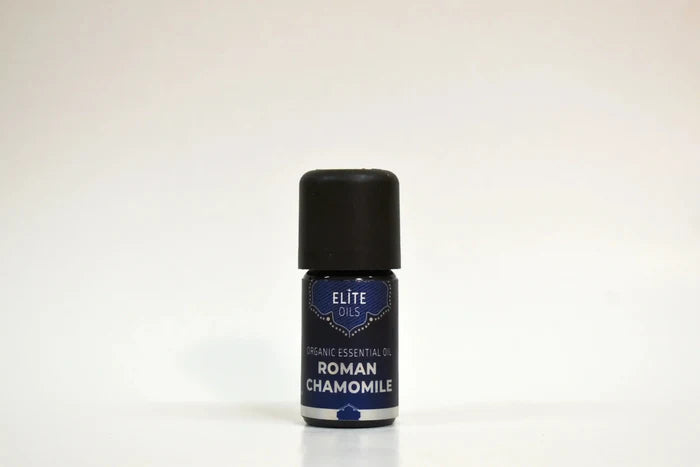 Bottle of Elite Oils Roman Chamomile essential oil on a white background