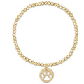 "Hand beaded on high performance elastic for a slight stretch to easily roll on and off your wrist"