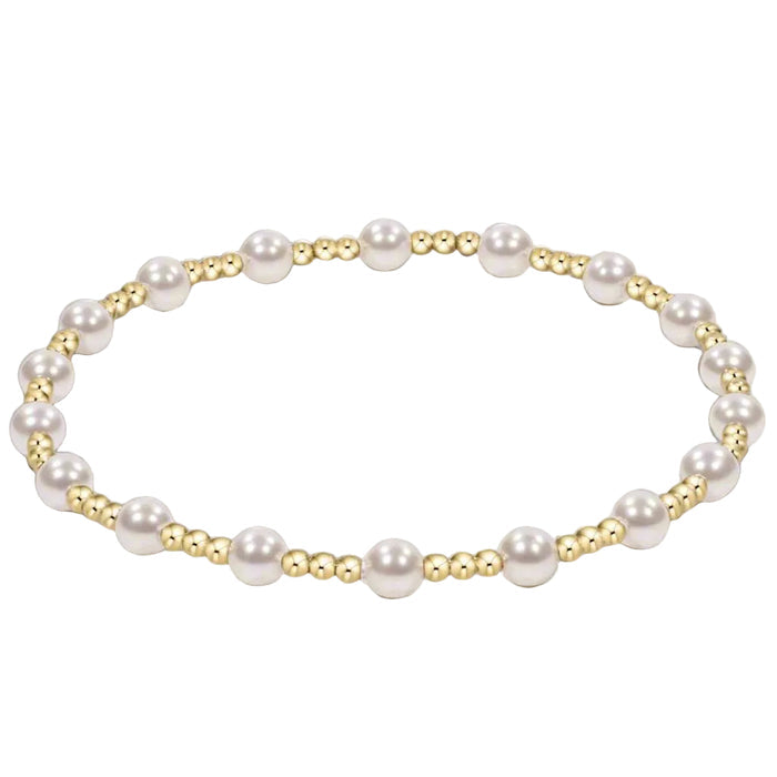 Perfect for gift-giving or personal collection building, this classic gold bead bracelet transitions seamlessly from casual to elegant occasions.