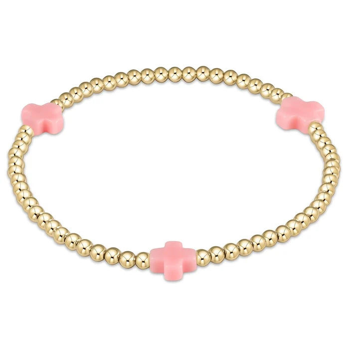 enewton design Signature Cross Pattern Bracelet with gold beads and pink cross accents on white background