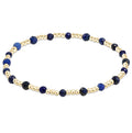 enewton Sincerity Pattern Bead Bracelet with lapis gemstone beads and 14k gold-filled beads arranged in a repeating pattern on a stretch band.