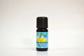 Essential oil bottle labeled 'Frankincense' on a white background