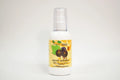 Bottle of grape seed oil with a label on a white background