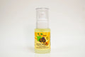 Bottle of grape seed oil with a white background