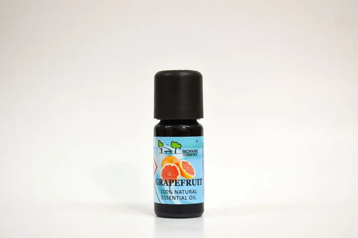 Grapefruit essential oil bottle with a blue label on a white background