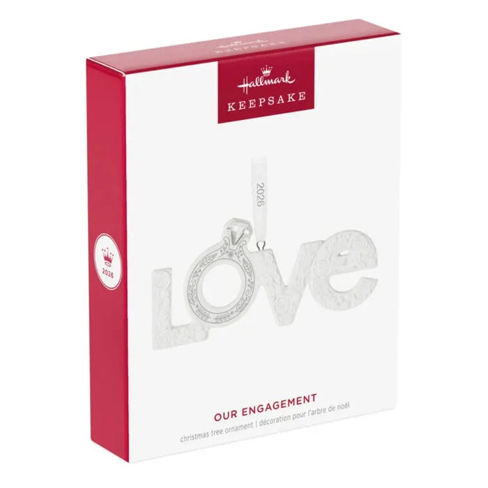 Hallmark Keepsake Christmas ornament packaging with 'Our Engagement' design on a white background