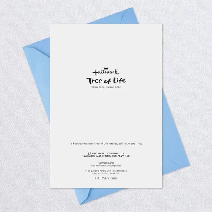 Hallmark Tree of Life card with blue envelope on a light gray background