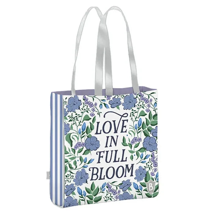Tote bag with floral design and 'Love in Full Bloom' text on a white background