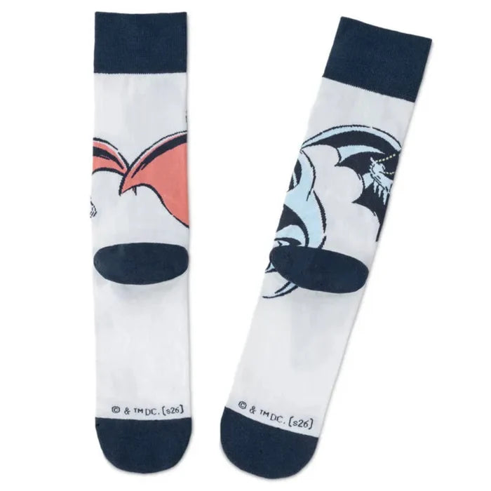 Two socks with cartoon character  superman and batman design on a white background