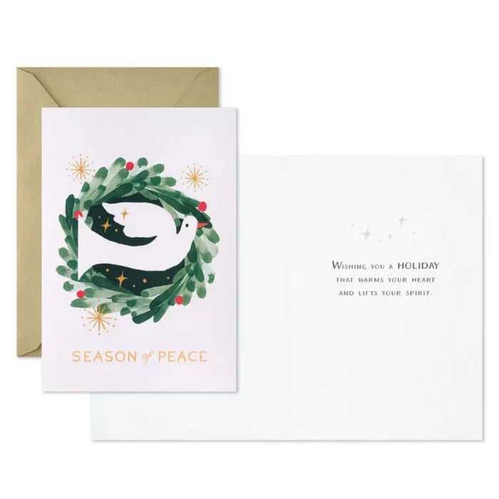 Holiday card with a dove and wreath design, featuring the text 'Season of Peace'.