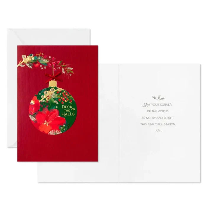 Christmas card with a green ornament and red background