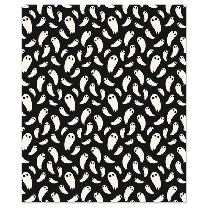 Throw blacket Pattern of white ghosts on a black background