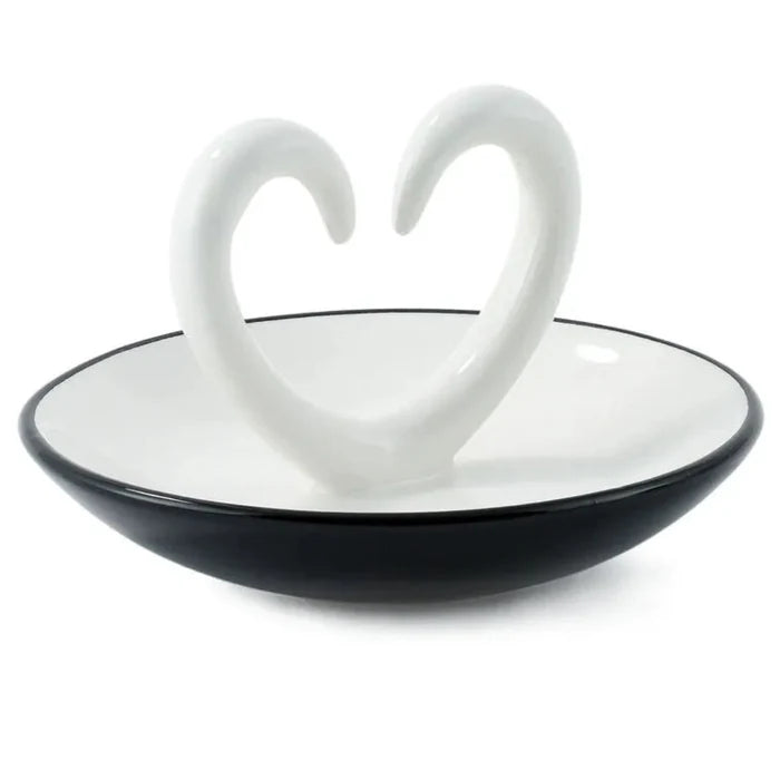 Side view Ring dish ceramic with arms that shape a heart. trinket dish on a white background.