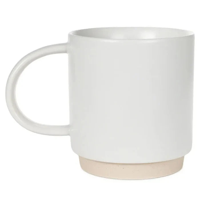 White mug with beige base on a white background