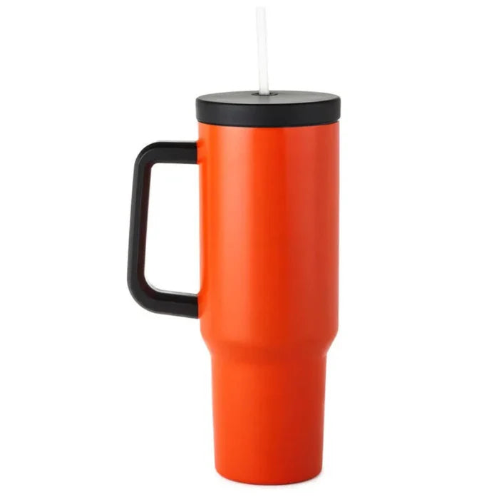 Backside of theOrange travel mug with black handle and lid on a white background