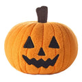 Plush pumpkin toy that zips along when you pull the back, it has a jack-o'-lantern face on a white background