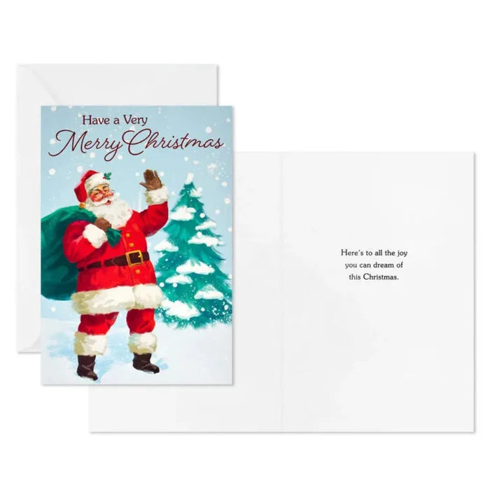 Christmas card with Santa Claus and a tree, featuring text 'Have a Very Merry Christmas'.