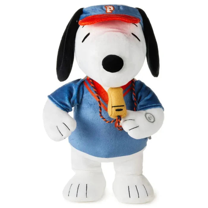 Plush toy of thew Snoopy character wearing a blue shirt and cap "varsity coach"  on a white background